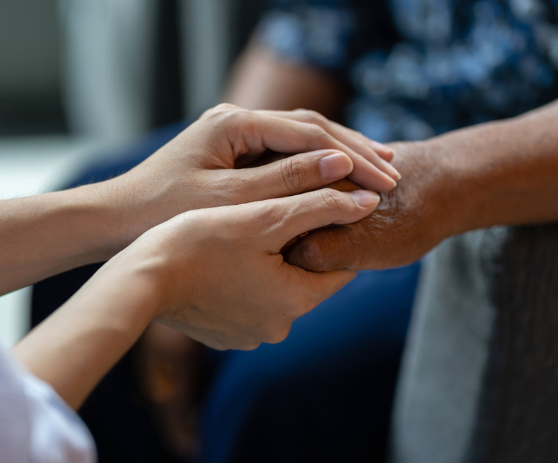 Hands reaching out in support